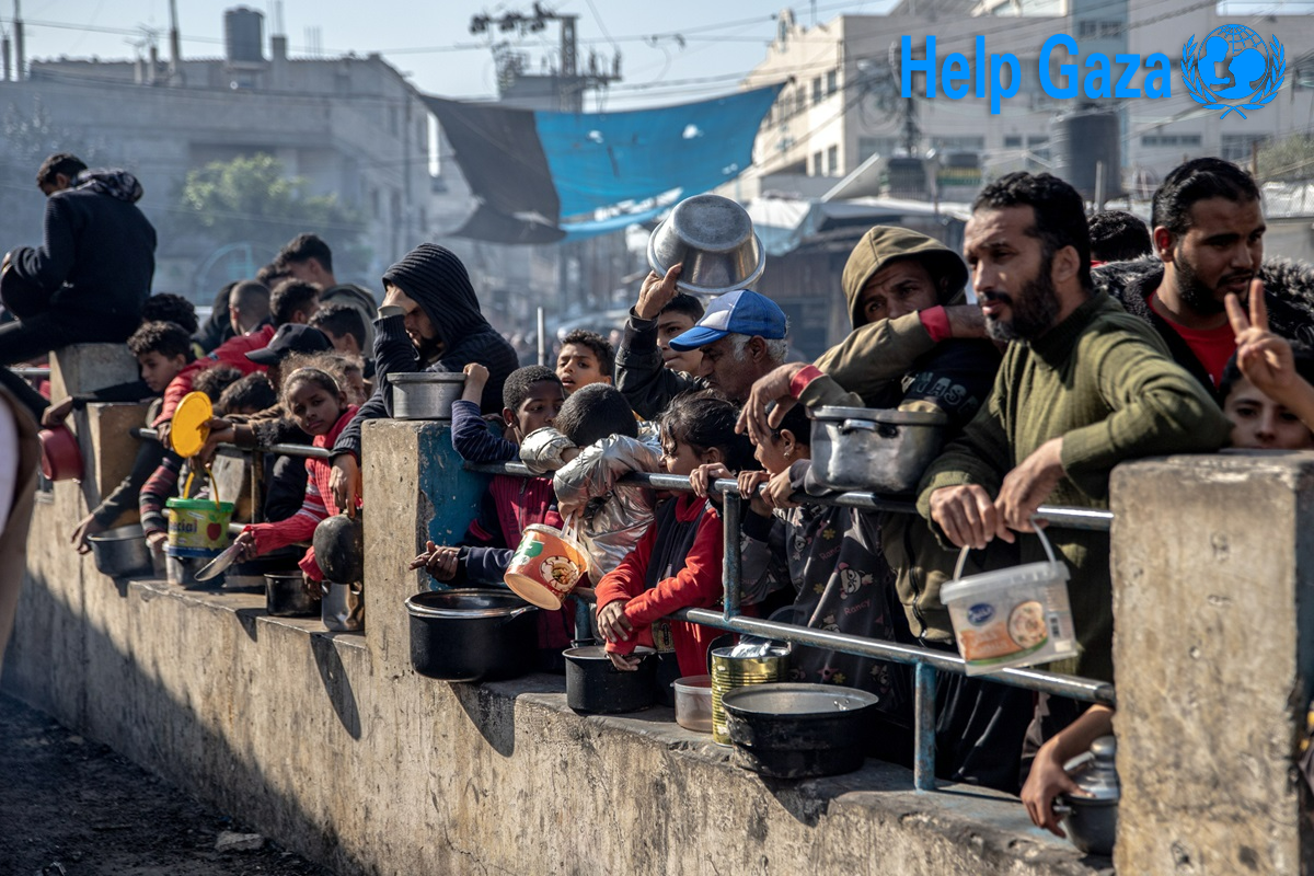 Civilians in Gaza queuing for food aid distribution