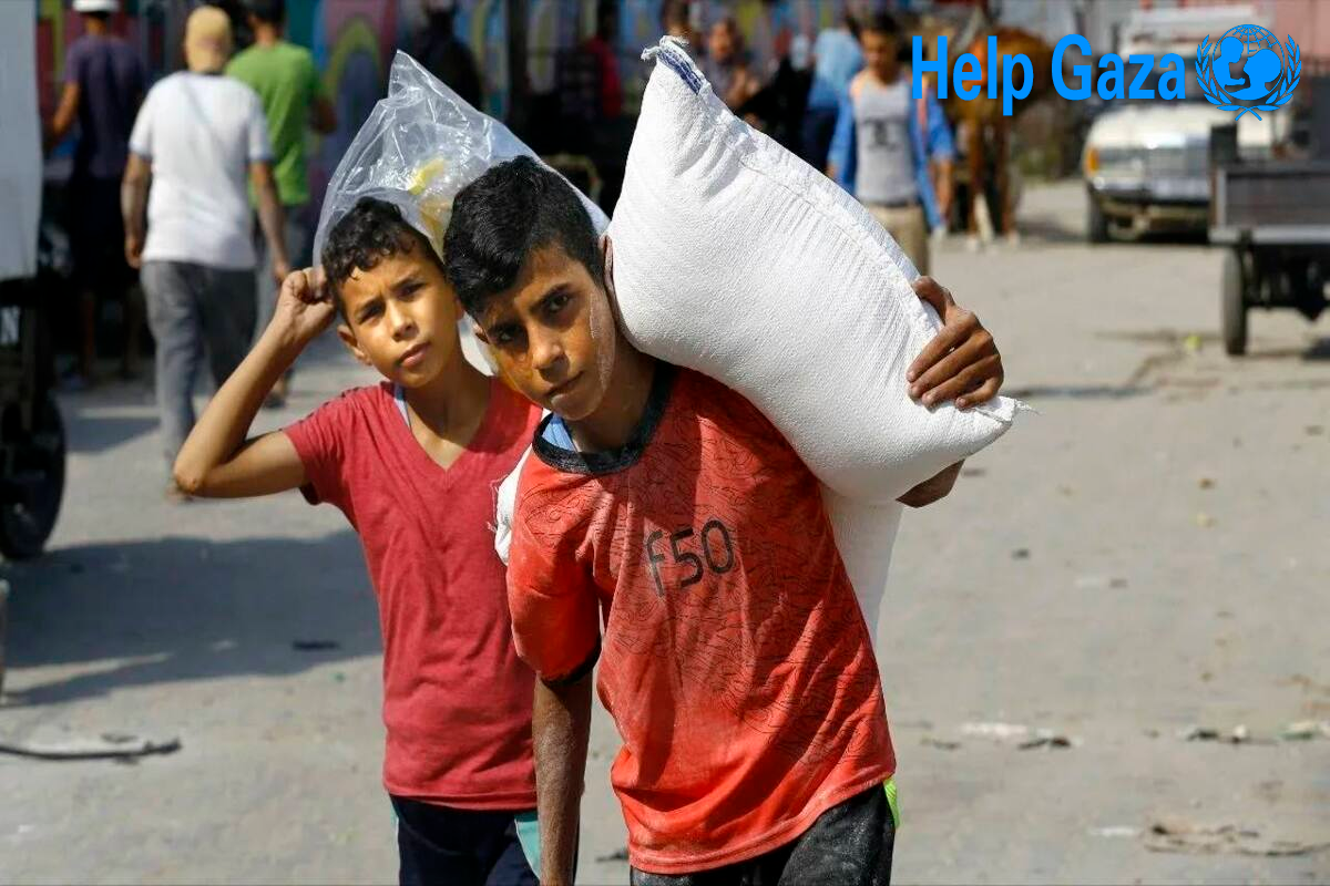 Volunteers distributing food packages to families in Gaza